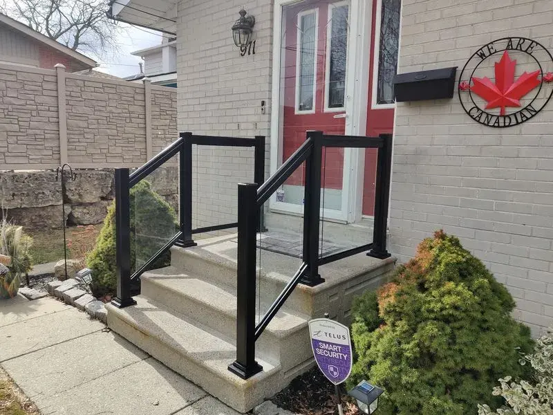 Black aluminum glass railings a porch entrance (Id A-281)