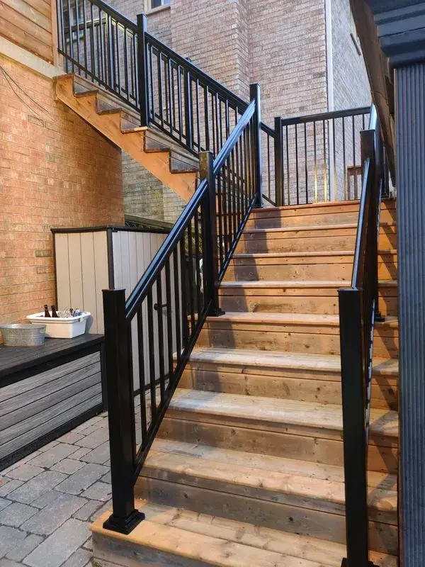 aluminum black railings on wood outdoor stairs A-266