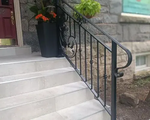 Wrought iron porch railing installation